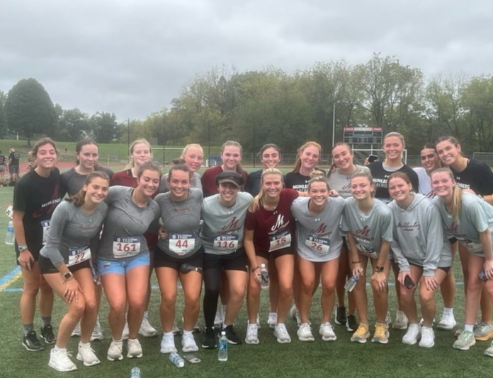 The women's lacrosse team running the 9/11 Hero’s of Lehigh Valley 5K. Photo credit to @muhlenbergwlax on Instagram.